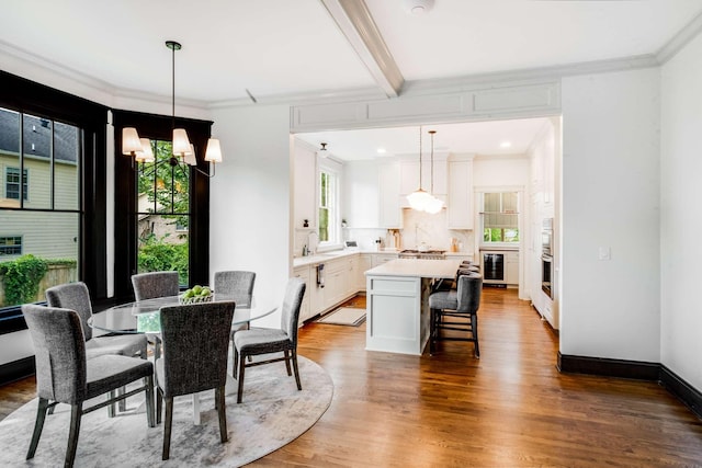 931 Caldwell Ln, Nashville, TN 37204 - dining space featuring crown molding, wood finished floors, beverage cooler, and beam ceiling