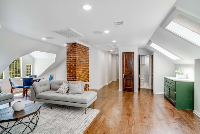 931 Caldwell Ln, Nashville, TN 37204 - bonus room with light wood-type flooring, attic access, visible vents, and lofted ceiling with skylight
