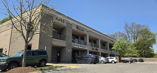 8047 Bienville Dr Unit X6, Nashville, TN 37211 - view of property featuring uncovered parking