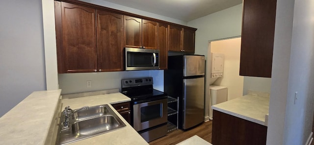 8047 Bienville Dr Unit X6, Nashville, TN 37211 - kitchen featuring appliances with stainless steel finishes, a sink, and light countertops