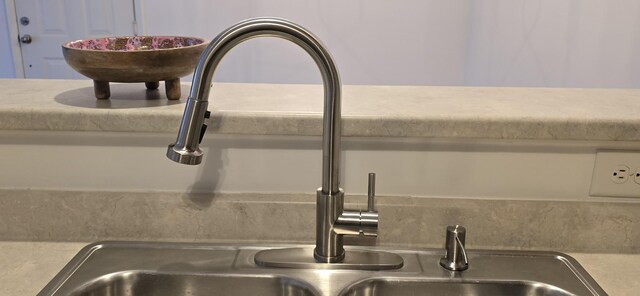 8047 Bienville Dr Unit X6, Nashville, TN 37211 - kitchen view of a sink, light countertops, and decorative backsplash