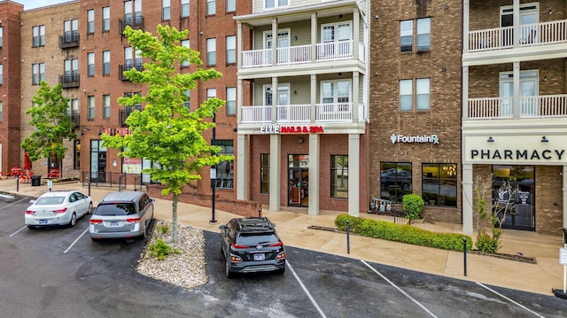 8047 Bienville Dr Unit X6, Nashville, TN 37211 - view of building exterior featuring uncovered parking