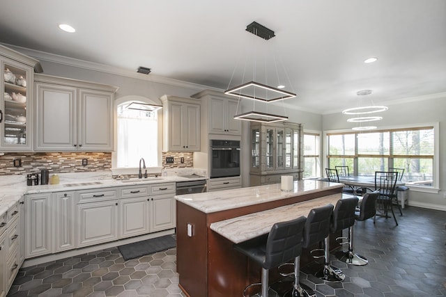 4512 General Forest Cir, Bon Aqua, TN 37025 - kitchen featuring tasteful backsplash, a sink, wall oven, and a wealth of natural light