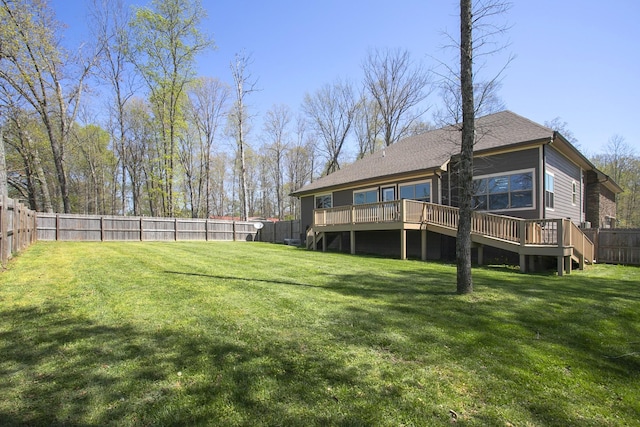 4512 General Forest Cir, Bon Aqua, TN 37025 - rear view of property featuring a yard, a fenced backyard, a wooden deck, and a shingled roof