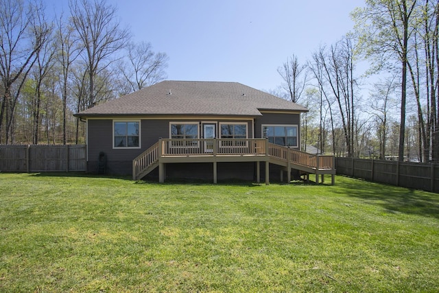 4512 General Forest Cir, Bon Aqua, TN 37025 - back of property featuring stairs, a fenced backyard, a yard, a deck, and a shingled roof