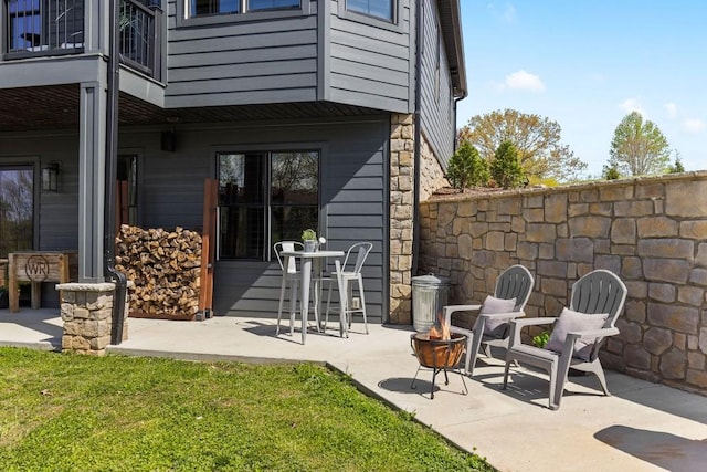 view of patio / terrace with a balcony