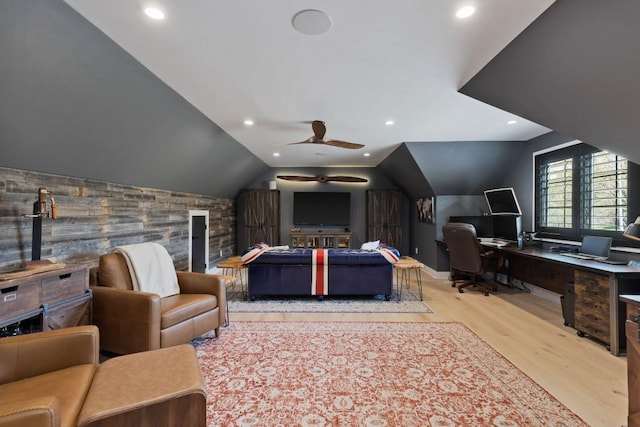 bedroom with recessed lighting, lofted ceiling, and wood finished floors
