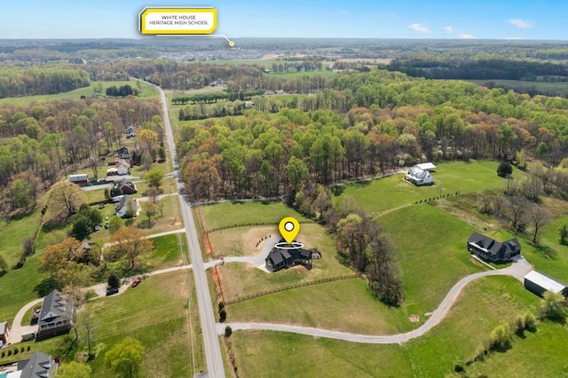 aerial view featuring a view of trees
