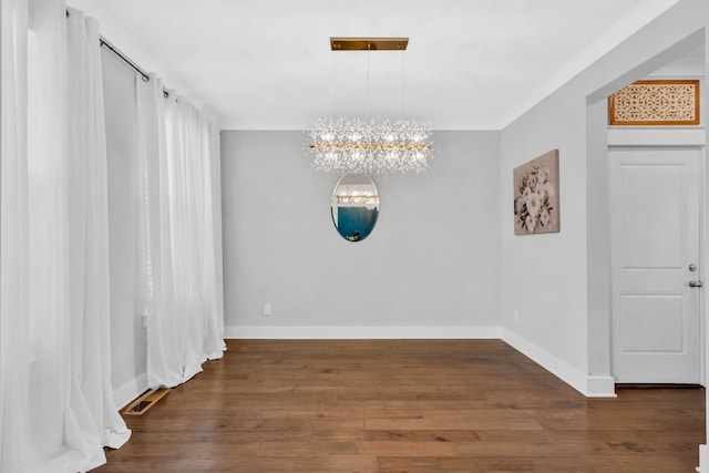 779 Newcomb St, Franklin, TN 37064 - unfurnished dining area featuring a chandelier, baseboards, and wood finished floors