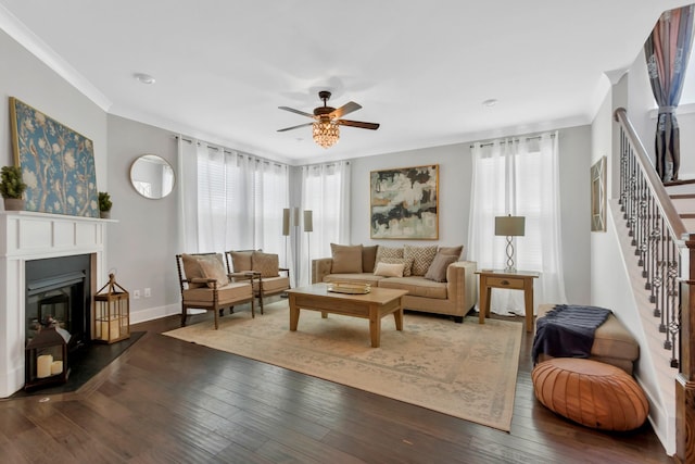 779 Newcomb St, Franklin, TN 37064 - living area featuring stairs, ceiling fan, a glass covered fireplace, dark wood-style floors, and baseboards
