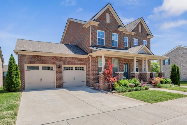 779 Newcomb St, Franklin, TN 37064 - view of front of home with brick siding, a garage, concrete driveway, and a porch