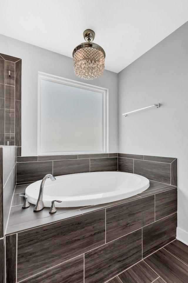 779 Newcomb St, Franklin, TN 37064 - full bath with a garden tub and a chandelier
