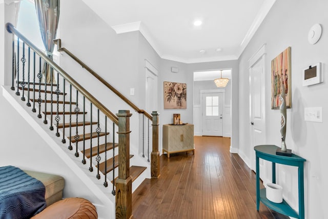 779 Newcomb St, Franklin, TN 37064 - entryway featuring crown molding, baseboards, wood-type flooring, and stairs