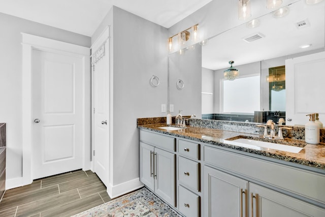 779 Newcomb St, Franklin, TN 37064 - full bathroom featuring baseboards and double vanity