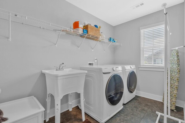 779 Newcomb St, Franklin, TN 37064 - laundry room with separate washer and dryer and baseboards