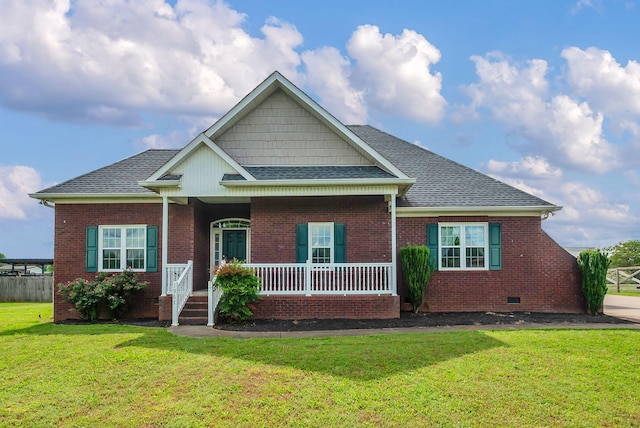 1967 Overland Dr, Chapel Hill, TN 37034 - view of front of house with roof with shingles, covered porch, brick siding, and a front yard