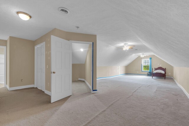 1967 Overland Dr, Chapel Hill, TN 37034 - additional living space with carpet floors, lofted ceiling, baseboards, a textured ceiling, and a ceiling fan