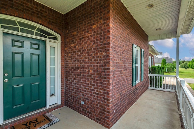 1967 Overland Dr, Chapel Hill, TN 37034 - doorway to property with brick siding and covered porch