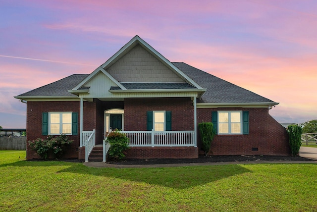 1967 Overland Dr, Chapel Hill, TN 37034 - view of front facade with a porch, a lawn, roof with shingles, and brick siding