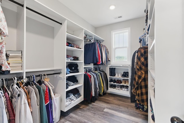 spacious closet with wood finished floors and visible vents