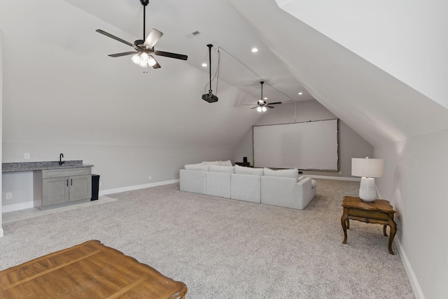 interior space featuring recessed lighting, a ceiling fan, carpet, and vaulted ceiling
