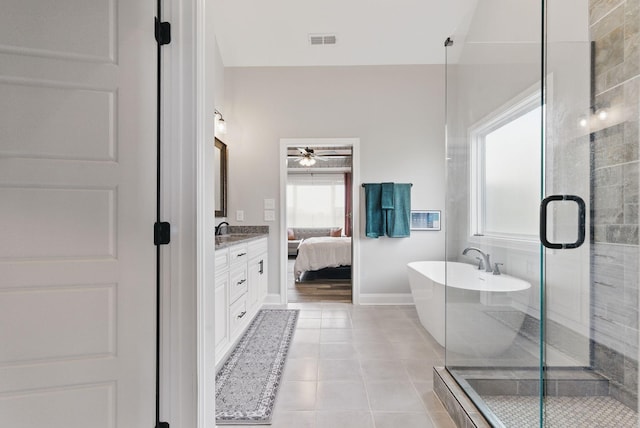 full bathroom featuring visible vents, a ceiling fan, a shower stall, and vanity
