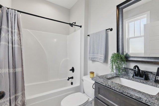full bath featuring shower / tub combo with curtain, toilet, and vanity