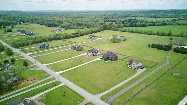 drone / aerial view with a rural view and a forest view