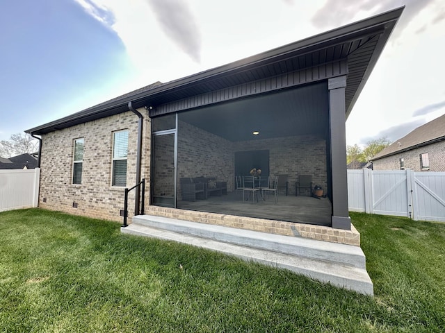 1049 Veridian Dr Unit A, Clarksville, TN 37043 - back of house featuring a gate and brick siding