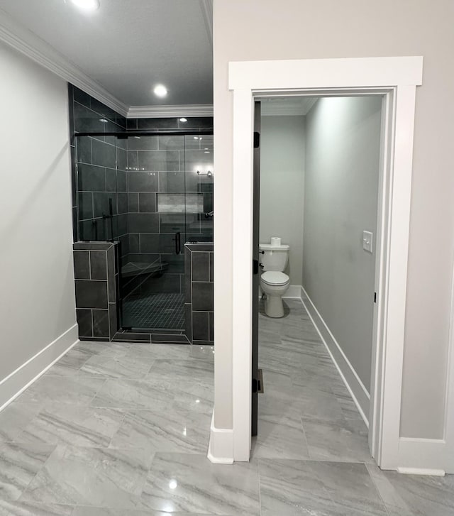 1049 Veridian Dr Unit A, Clarksville, TN 37043 - full bathroom with baseboards, ornamental molding, marble look tiles, toilet, and a stall shower