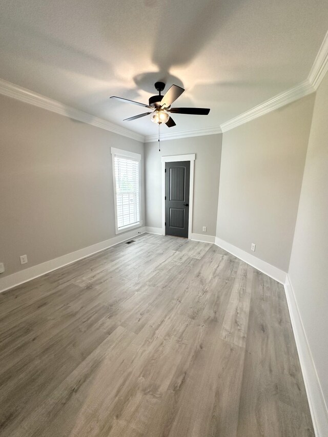 1049 Veridian Dr Unit A, Clarksville, TN 37043 - empty room featuring ornamental molding, wood finished floors, ceiling fan, and baseboards