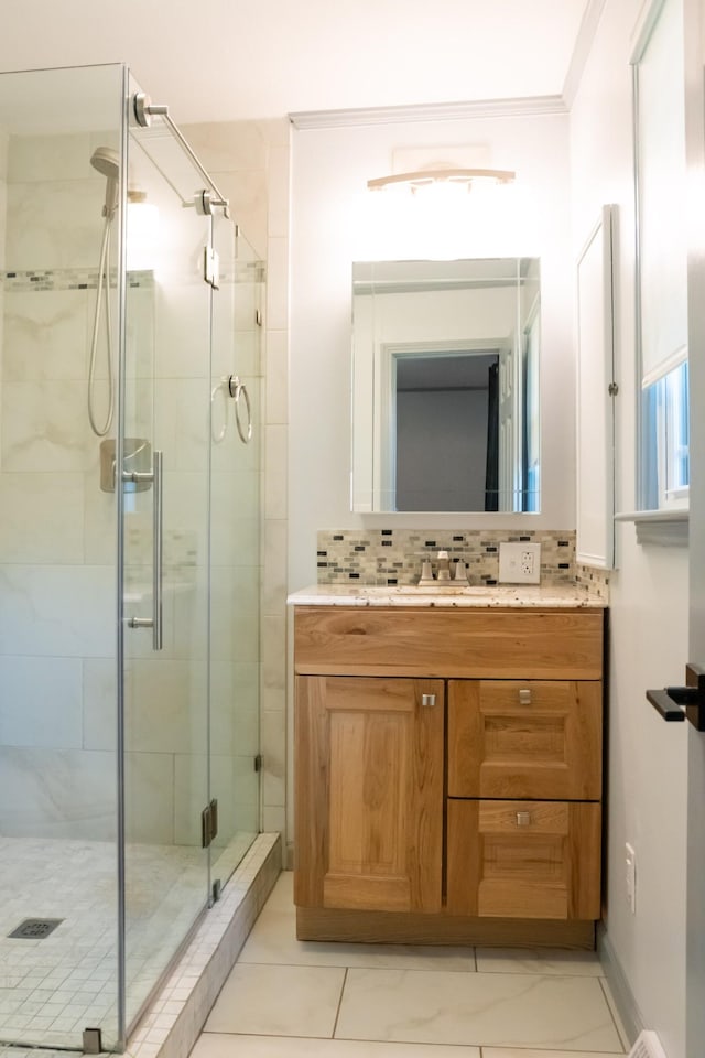 1203 W White Oak Dr, Cookeville, TN 38501 - bathroom featuring a shower stall, vanity, and backsplash