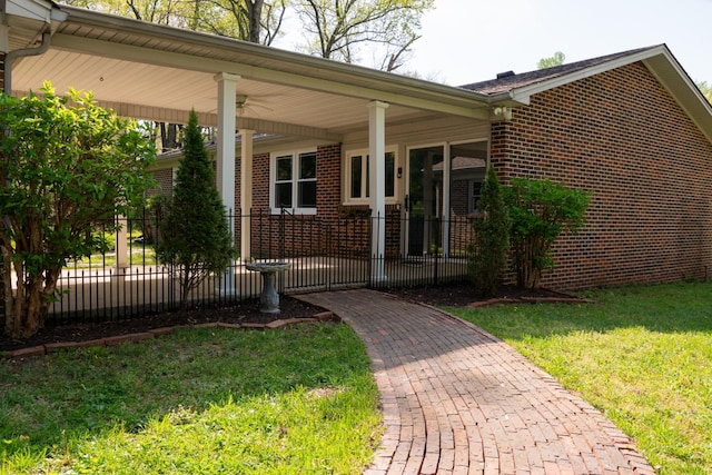 1203 W White Oak Dr, Cookeville, TN 38501 - view of front of home with brick siding, fence, and covered porch