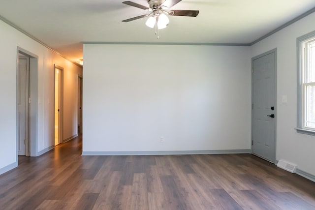 1203 W White Oak Dr, Cookeville, TN 38501 - spare room with crown molding, wood finished floors, ceiling fan, and visible vents