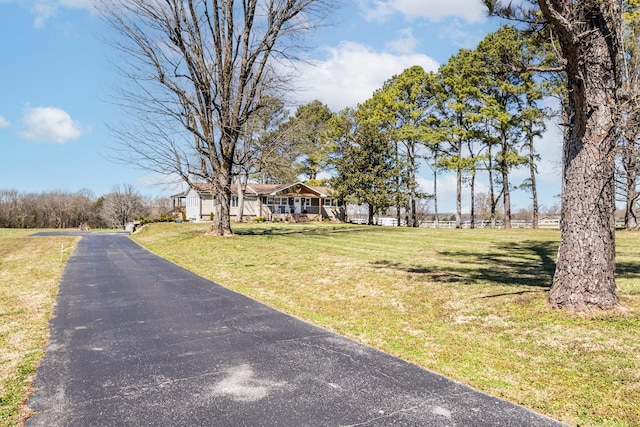 exterior space with a front yard