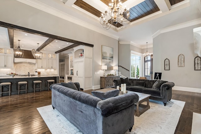 700 Pendragon Ct, Franklin, TN 37067 - living area with baseboards, a chandelier, crown molding, beamed ceiling, and dark wood finished floors