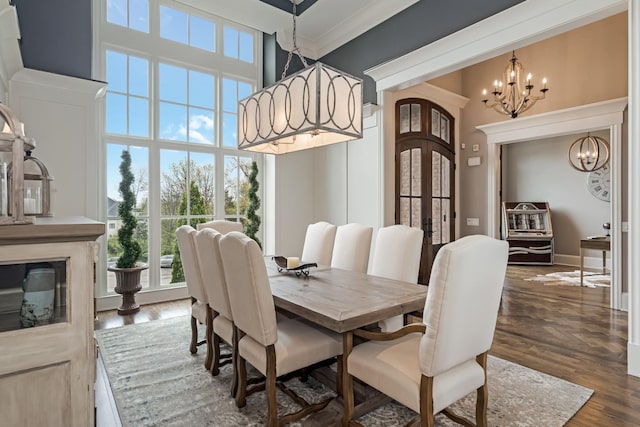 700 Pendragon Ct, Franklin, TN 37067 - dining space with a chandelier, french doors, a towering ceiling, and a wealth of natural light