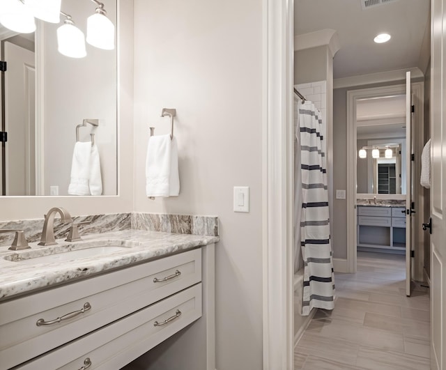 700 Pendragon Ct, Franklin, TN 37067 - bathroom featuring recessed lighting, shower / tub combo with curtain, vanity, and visible vents