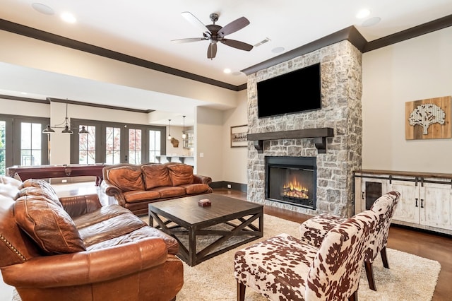 700 Pendragon Ct, Franklin, TN 37067 - living room with ornamental molding, recessed lighting, a fireplace, french doors, and a ceiling fan