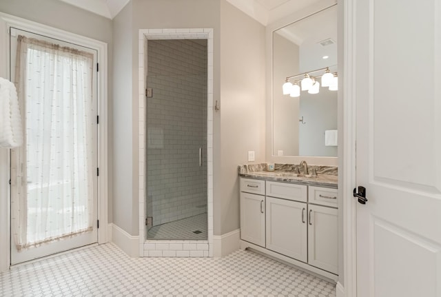 700 Pendragon Ct, Franklin, TN 37067 - full bath featuring tile patterned flooring, baseboards, a shower stall, and vanity