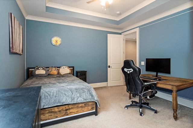 700 Pendragon Ct, Franklin, TN 37067 - carpeted bedroom featuring a tray ceiling, baseboards, a ceiling fan, and crown molding