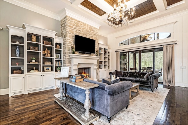 700 Pendragon Ct, Franklin, TN 37067 - living area featuring a notable chandelier, dark wood-style flooring, ornamental molding, a fireplace, and coffered ceiling