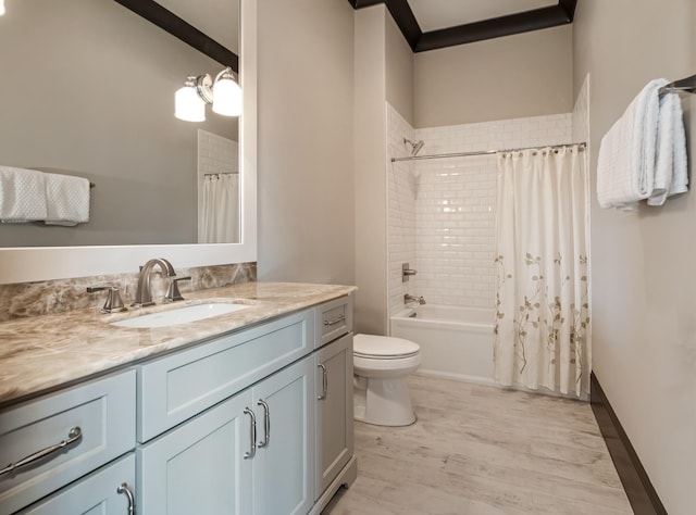 700 Pendragon Ct, Franklin, TN 37067 - bathroom featuring shower / bath combo, vanity, toilet, and wood finished floors