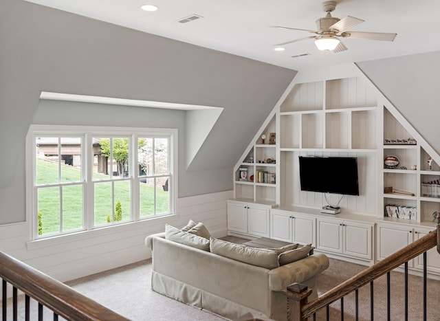 700 Pendragon Ct, Franklin, TN 37067 - living room featuring built in features, visible vents, ceiling fan, carpet floors, and wainscoting