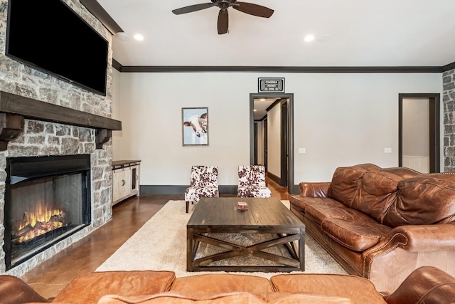 700 Pendragon Ct, Franklin, TN 37067 - living room with crown molding, ceiling fan, a stone fireplace, recessed lighting, and baseboards