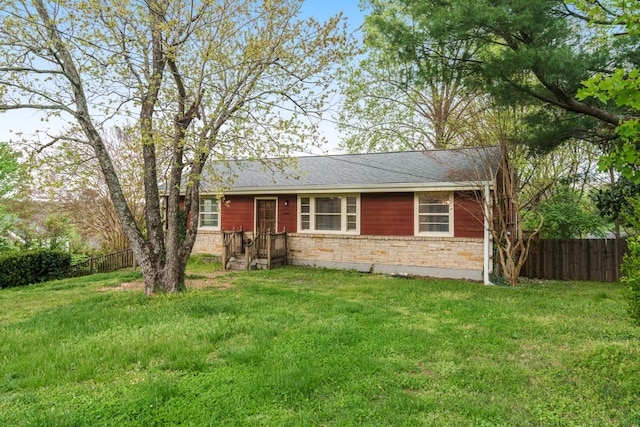ranch-style home featuring brick siding and a shingled roof