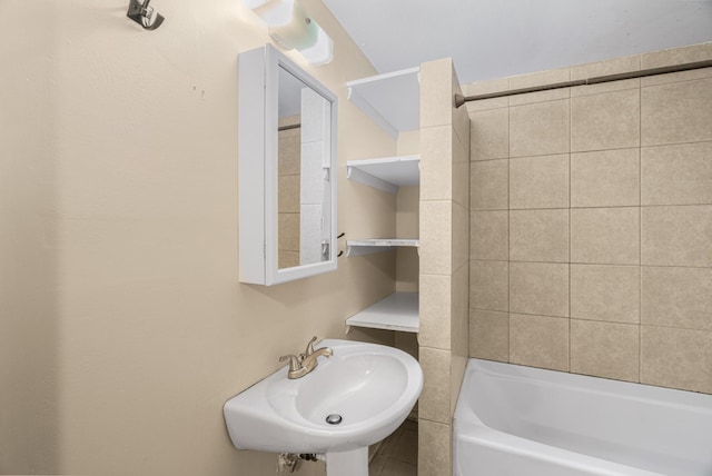full bathroom featuring a sink