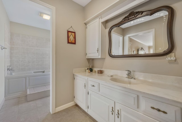 125 Sunnyside Ln, Columbia, TN 38401 - bathroom featuring a tub to relax in, baseboards, vanity, and tile patterned flooring