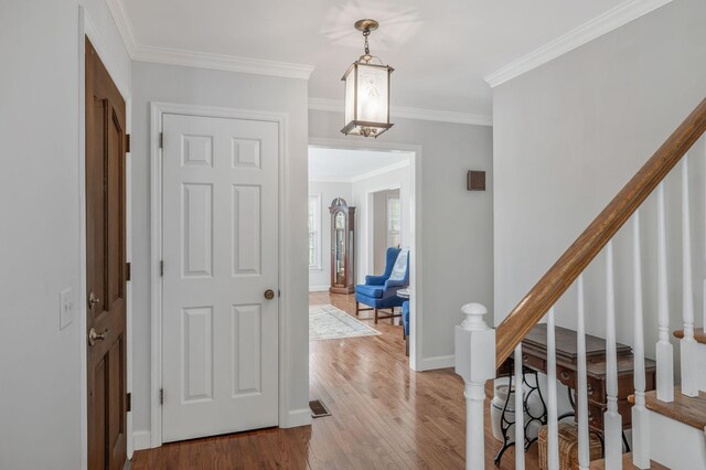 125 Sunnyside Ln, Columbia, TN 38401 - interior space with baseboards, wood finished floors, crown molding, and stairs