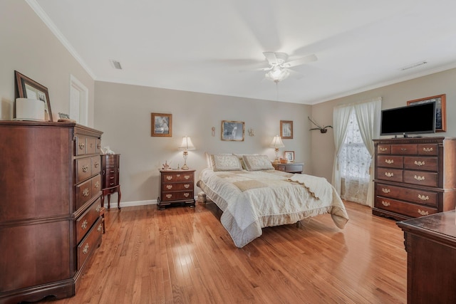 125 Sunnyside Ln, Columbia, TN 38401 - bedroom with light wood finished floors, a ceiling fan, visible vents, and crown molding